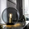 Fischer & Honsel Kleine Tischlampe DINI Rauchglas Schwarz Mit Messing - Kugel Ø 25cm